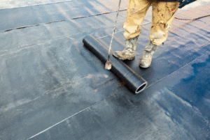 applying bitumen membrane system on villa roof to stop leak by salman syed technical services